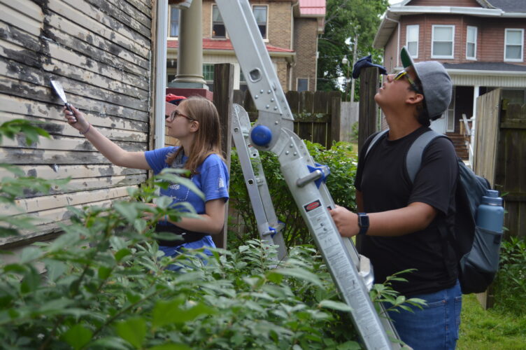Catholic work camp makes a difference for community News, Sports